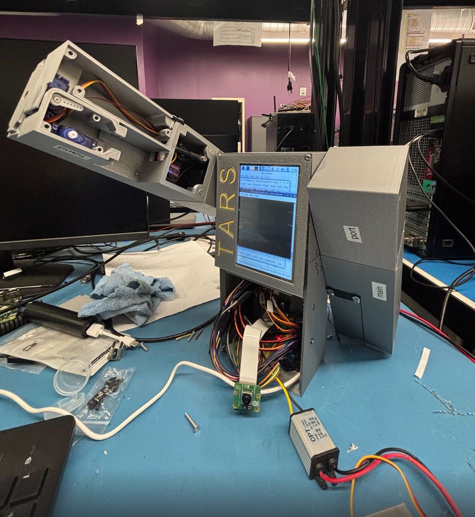 OpenAI TARS prototype with articulated arm